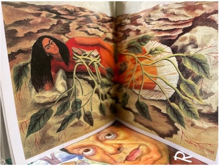 Colorful painting of a woman with dark hair and an orange dress across a two page spread in a book.