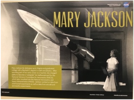 Illustration of a rocket next to Mary Jackson, NASA engineer. 