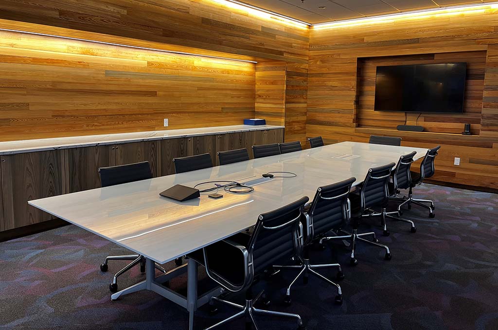 320 Seminar room with glass walls, 12 person capacity, with monitor and meeting hardware/software