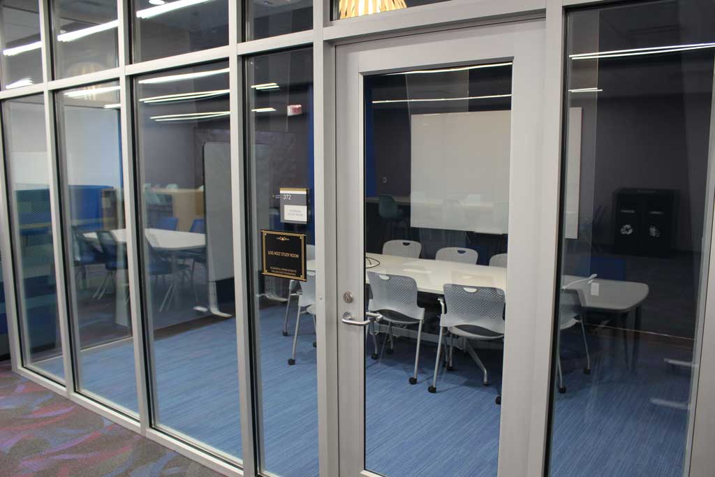 Study Room 372 with whiteboard, monitor, and 8 seat capacity