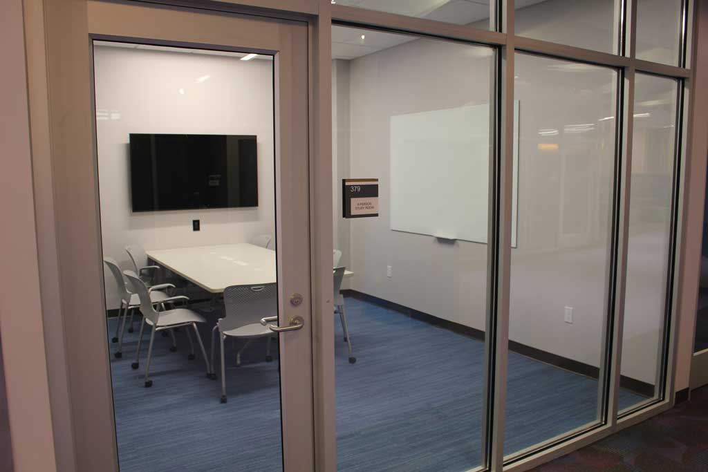 Study Room 379 with whiteboard, monitor, and 8 seat capacity