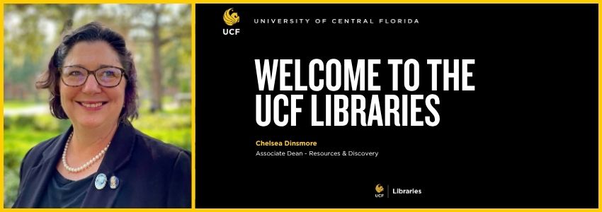 Woman with brown hair and glasses smiling with trees in the background.