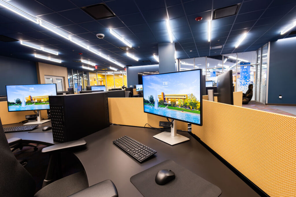 Computer work station with monitor and keyboard.