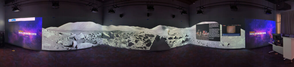 Immersion Studio room with 3 wall wrapped image projection providing 270 degree panorama view of being on the moon.