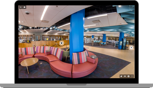 Laptop with virtual tour image on screen